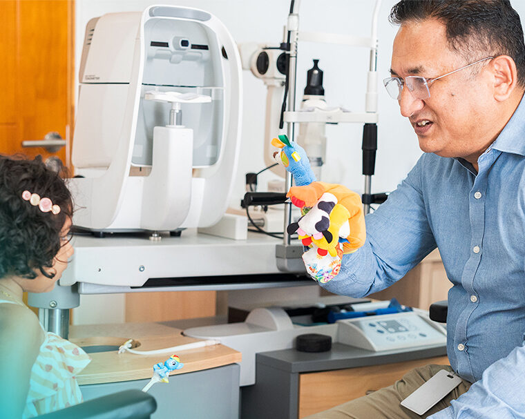 Child having an eye exam at EyeCare Hospital Maldives to prepare for the new school term